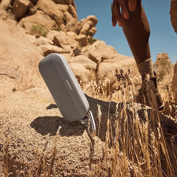 Bose NEW SoundLink Flex Portable Bluetooth Speaker (2nd Gen), Outdoor Speaker with Hi-Fi Audio, Up to 12 Hours Battery, Waterproof and Dustproof, + Slinger Hard Travel Case & USB Plug (Sandstone)